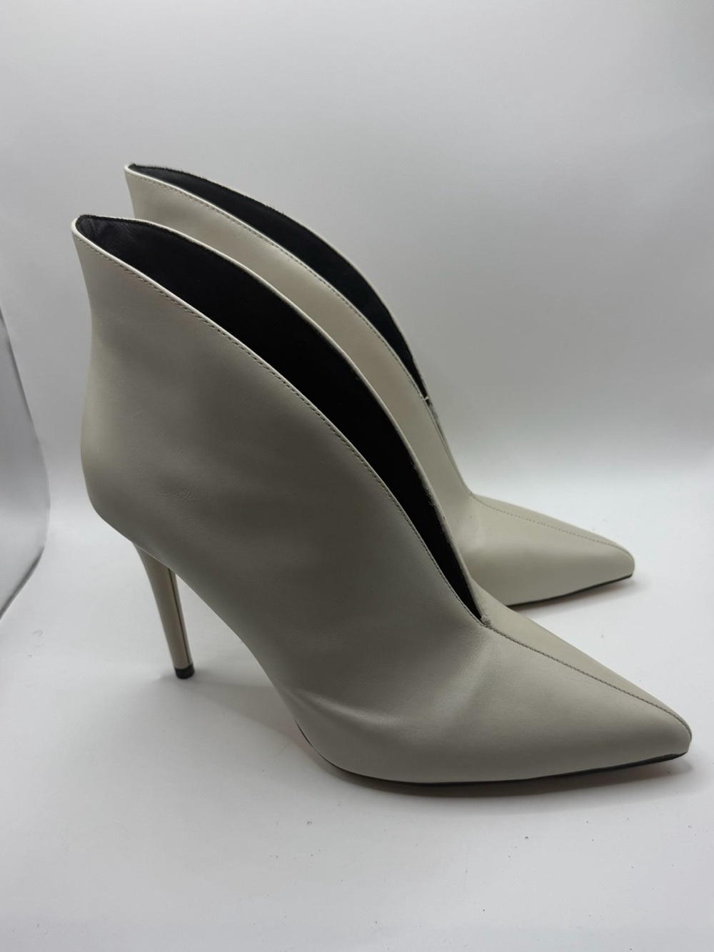 Jessica Simpson’s White Leather V - Vamp Ankle Booties